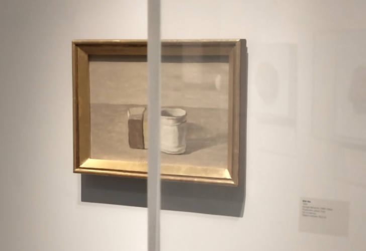 photograph of Morandi painting partially obscured